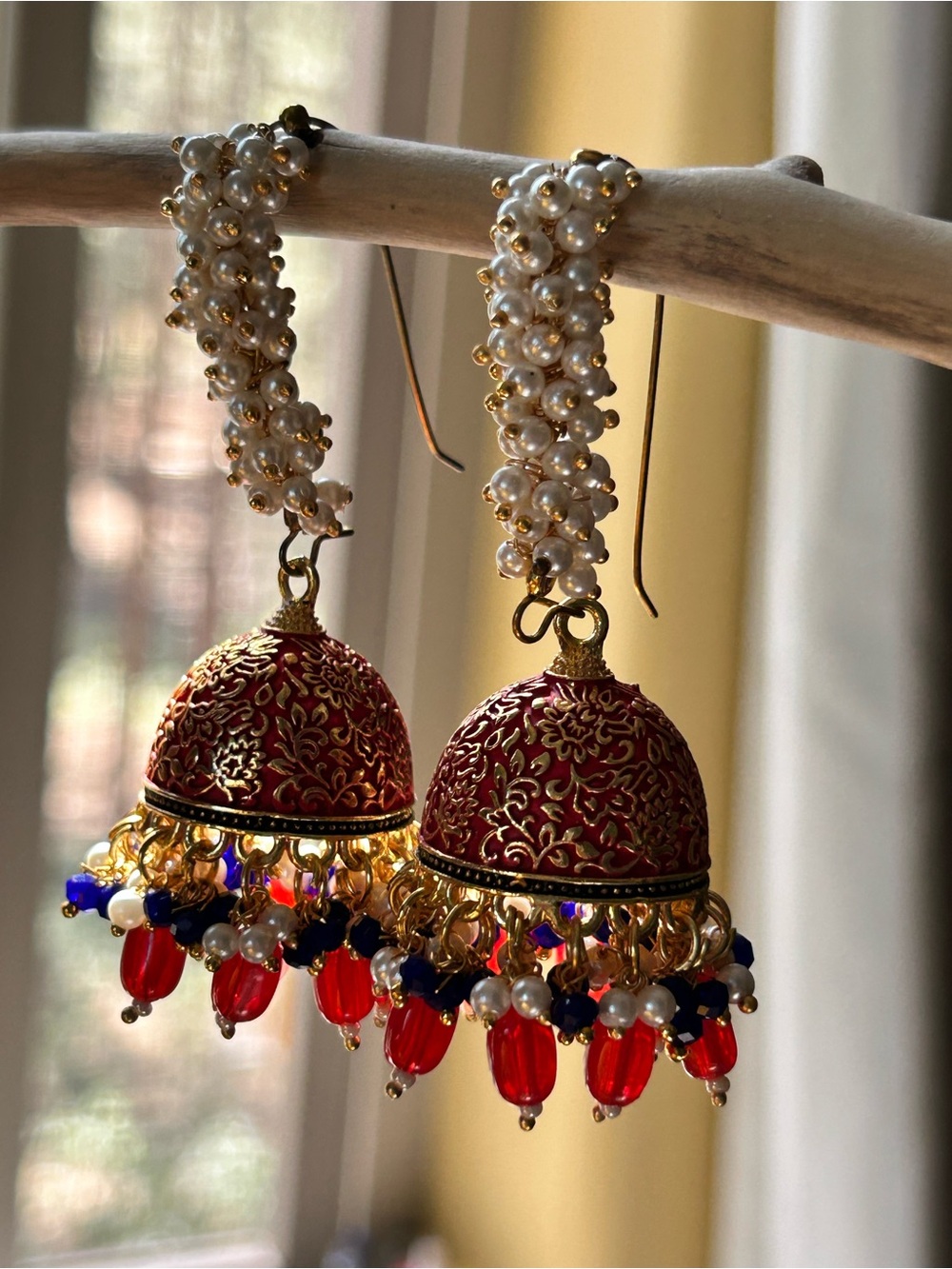Gold-Tone Red and Blue Jhumka Earrings with Pearl-Embellished Hooks